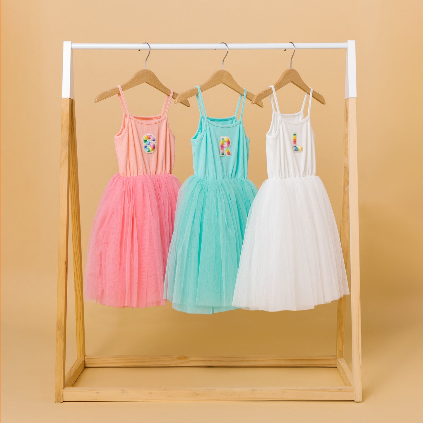 Add some Joy to the tutu dress with a personalised rainbow letter