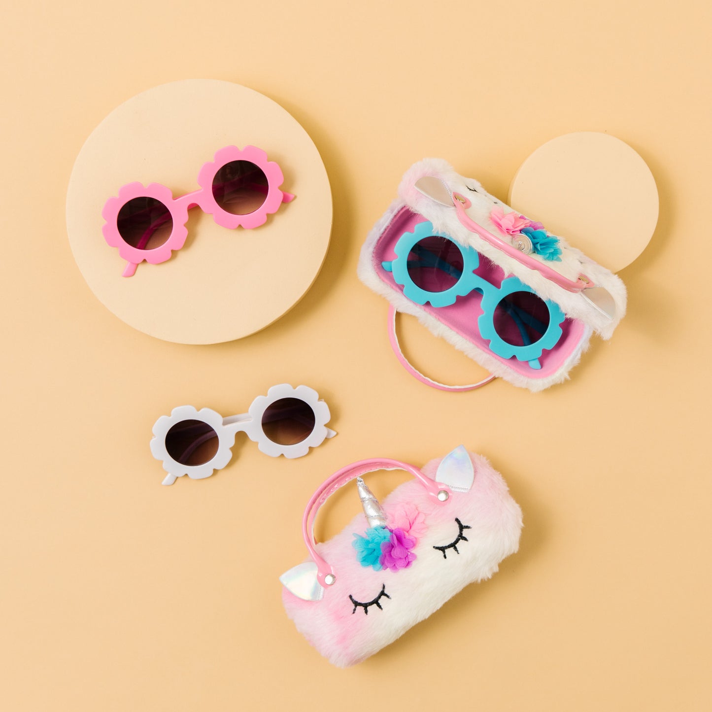 Add our fashion flower sunglasses, available in pink, aqua and white