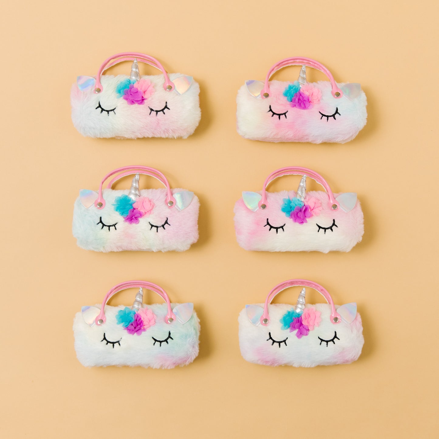 Every plush unicorn bag has a slightly different rainbow design